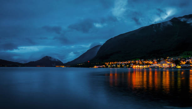 istock Night panoramic view of beautiful city Orsta, Norway 1320848536