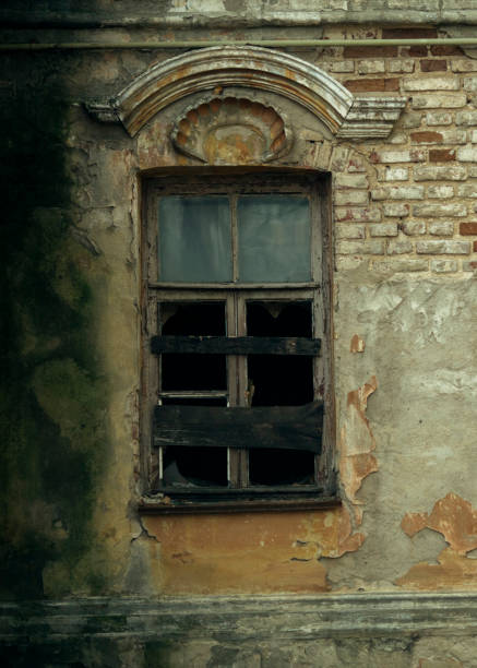 istock Abandoned. A window in an ruined house. Russia. 1320852255