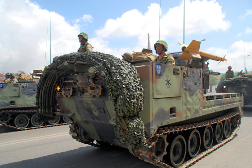 Setubal, Portugal: Portuguese Army MIM-72A/M48 Chaparral on parade with camouflage nets - self-propelled surface-to-air missile system based on the AIM-9 Sidewinder air-to-air missile system. The launcher vehicle is based on the M113 family of vehicles - BrigMec / Brigada Mecanizada BAA BMI.