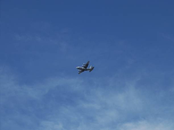 istock war plane over the city 1320858754