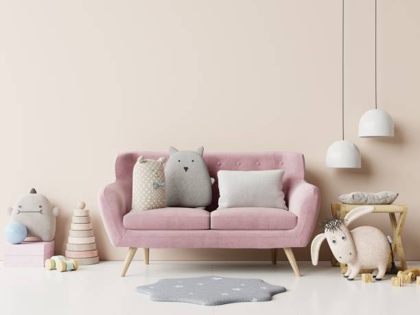 istock Mockup wall in the children's room with pink sofa on empty white wall background. 1320870105