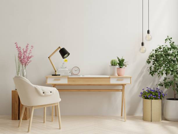 Office desk interior with mockup white wall. Office desk interior with mockup white wall,3d rendering boho photos stock pictures, royalty-free photos & images