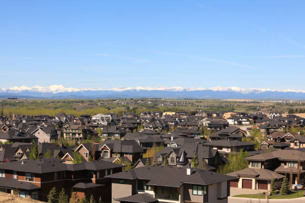 istock High End Residential Homes And Rooftops With Snowcapped Mountains 1320874958