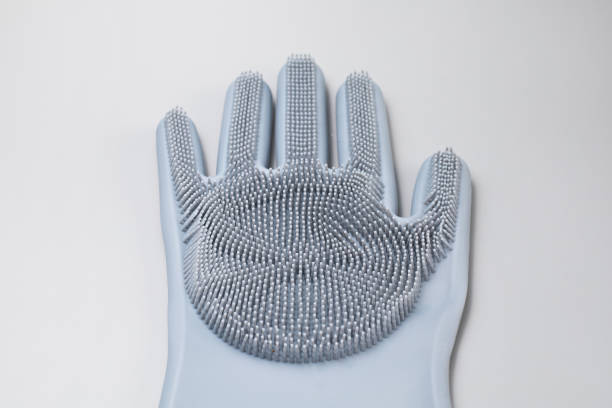 istock Rubber Glove Against Gray Background 1320878371