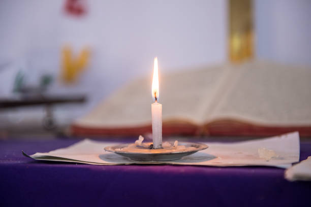 istock A Lighting Candle Infront of the Bible 1320880009