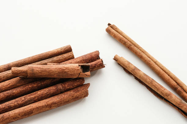 Kayu Manis or Cinnamon sticks isolated on white background. Kayu Manis or Cinnamon sticks isolated on white background. kayu manis stock pictures, royalty-free photos & images