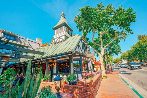 Downtown of Solvang, buildings, street view, city life. Solvang is a City in Southern California's Santa Ynez Valley has known for its traditional Danish Style Architecture. Solvang, California, USA - May 29, 2021