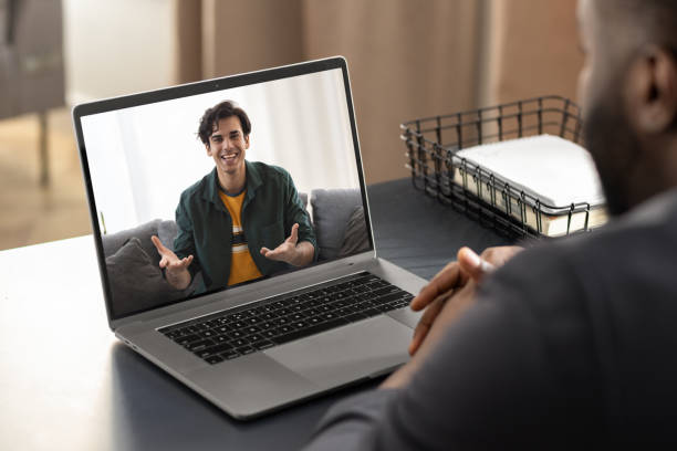 istock Video call, online education concept. Employees and students communicate via video conference, multiracial people, smiling 1320889553