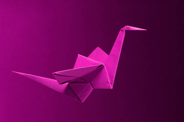 istock Pink Origami On Pink Background 1320892203