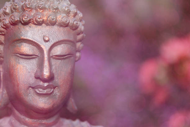 istock Buddha Statue in Outdoor Garden With Blurred Background 1320892435