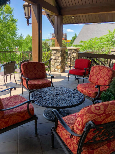 istock Outdoor dining area with red chairs 1320893563