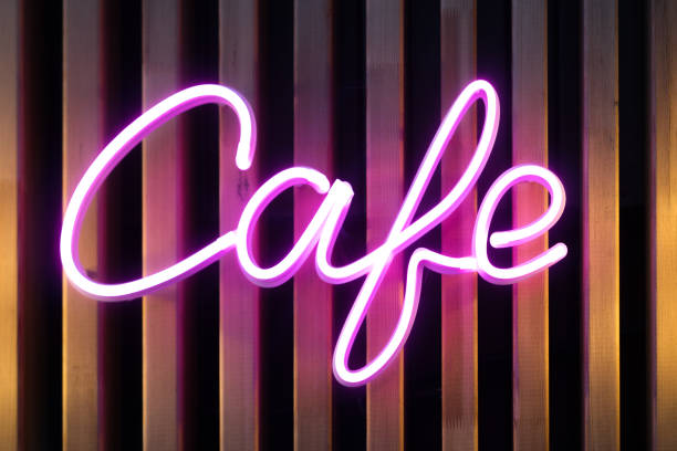 istock Cafe sign made from neon alphabet on a black background. 1320897442