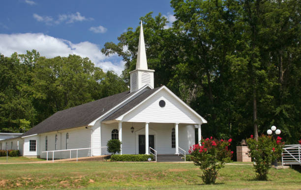 istock Small Rural Church With Blue Sky and Trees 1320898584