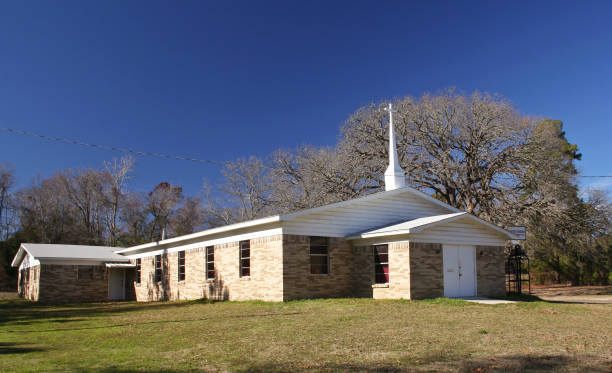 istock Small Rural Church With Blue Sky and Trees 1320899182