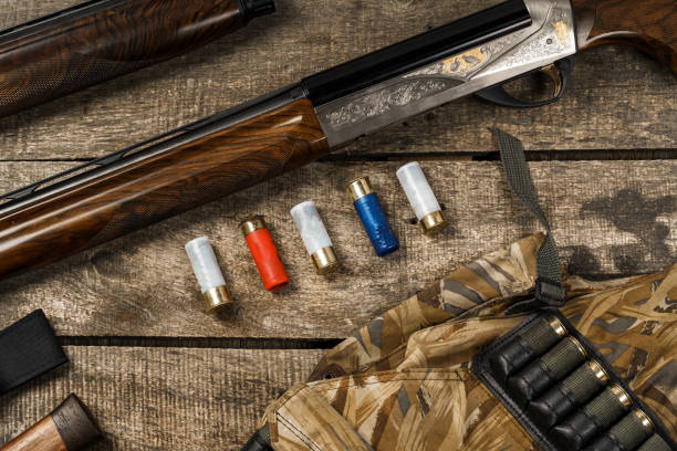 istock Various hunting equipment on old wooden background 1320904143