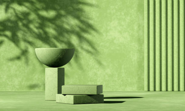 istock Minimal abstract background with 3D concrete podium display with green leaves 1320905742