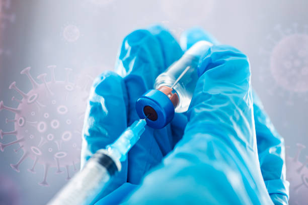 istock Covid-19 vaccination with vaccine bottle and syringe injection tool for coronavirus immunization treatment. 1320906711