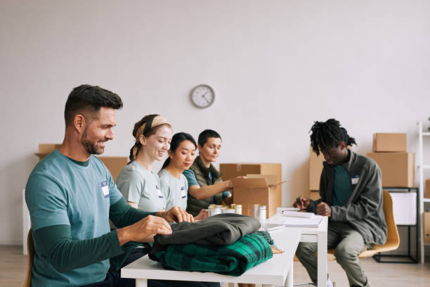 istock Volunteers in Donations Center 1320910692
