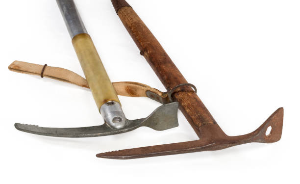 istock Heads of two different old ice axes on white background 1320910861