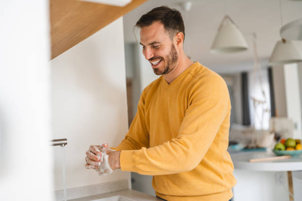 istock Coronavirus prevention. Man wash our hands with antibacterial soap. 1320912362
