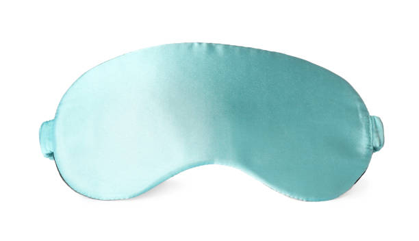 istock Turquoise sleep eye mask isolated on white 1320912377