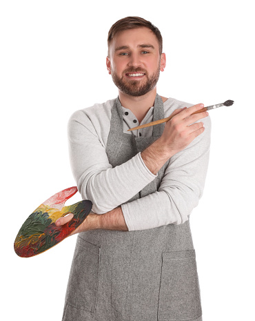 Man with painting tools on white background. Young artist