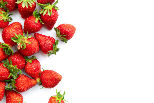 Ripe strawberries isolated on white background, summer berry, top view
