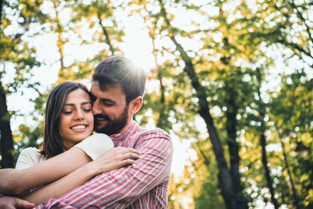 istock Young couple having fun in park. 1320921593