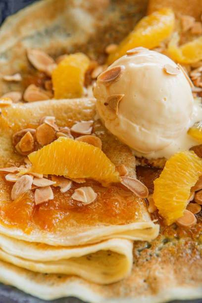 istock pancakes jam scoop ice cream orange slices 1320921595