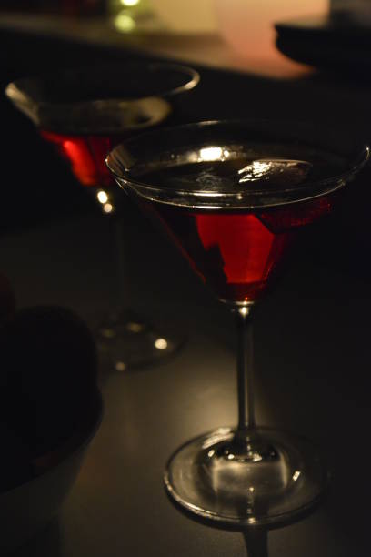 istock Alcohol cocktail cosmopolitan in martini glasses for romantic night 1320922716