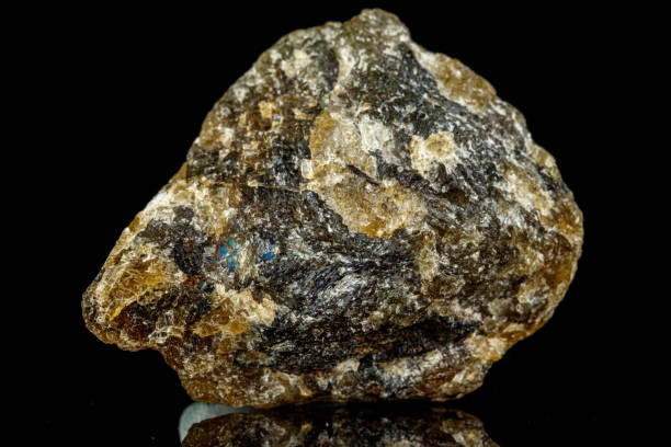 istock macro mineral stone Labradorite on a black background 1320923187
