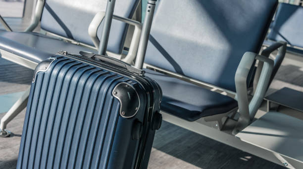istock Plastic travel suitcase in the airport hall 1320926016