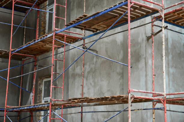 istock renovation or repair of a building facade using scaffolding 1320926513