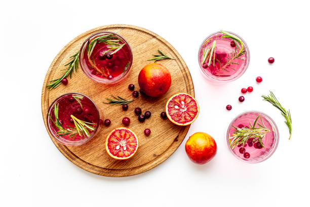 istock Red oranges refrashing drink lemonade with cranberry. Top view 1320927412