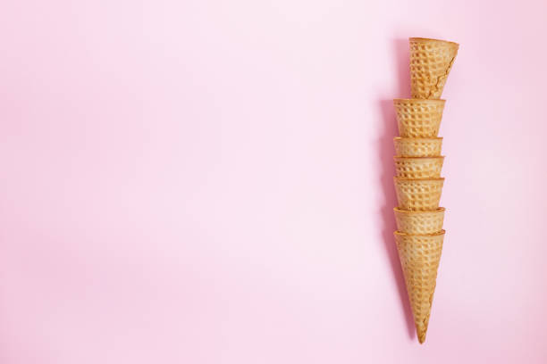istock Ice cream cones on pink color background. 1320928760