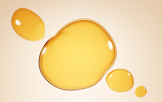 Manchas de oro de aceite, gotitas de suero o miel sobre fondo beige. Burbujas de esencia de colágeno, maqueta de gotas amarillas líquidas de aceite cosmético o alimenticio, ilustración 3D vista superior en charcos amarillos claros de agua photo