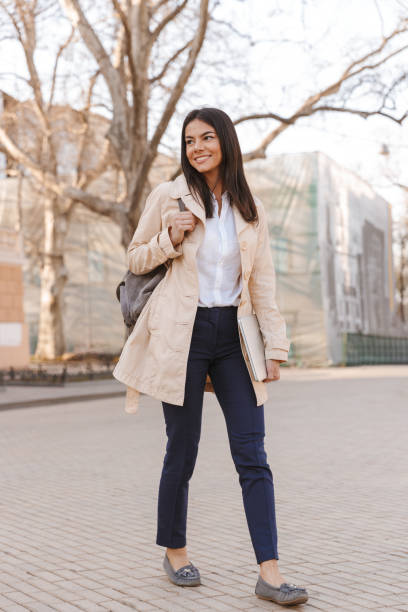 istock Attractive young woman dressed in autumn coat 1320929241