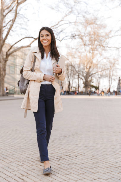 istock Pretty young woman dressed in autumn coat 1320929384