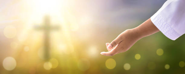 istock Help concept: hands of God over blurred autumn sunset background 1320930165