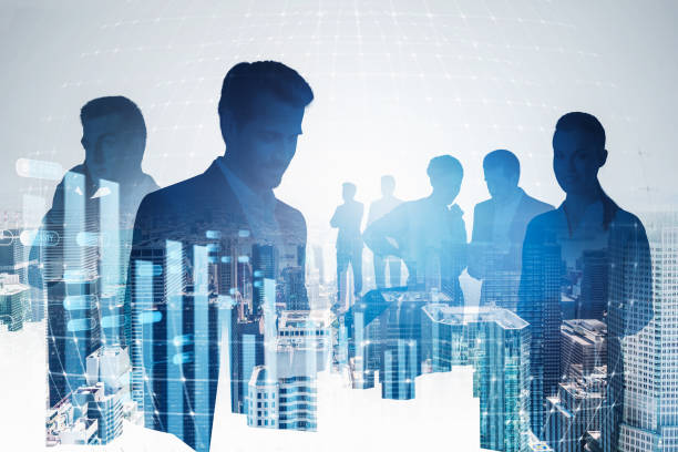 istock Businessmen in city and graph 1320930524