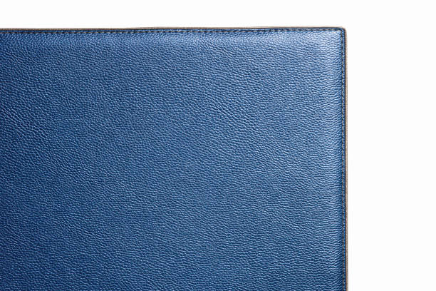 istock Blue fine leather with soft texture. Close-up edge with grey threds 1320932829