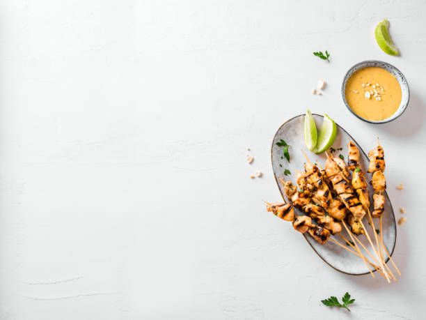 istock Chicken grilled satay skewers 1320934213