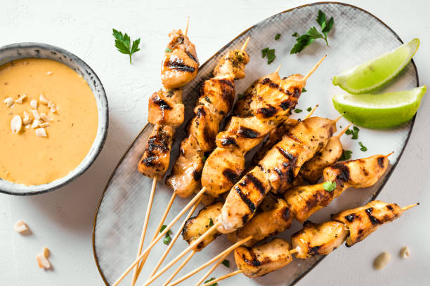 istock Chicken grilled satay skewers 1320934216