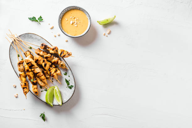 istock Chicken grilled satay skewers 1320934219