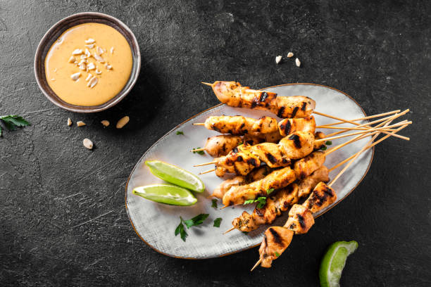 istock Chicken grilled satay skewers 1320934249