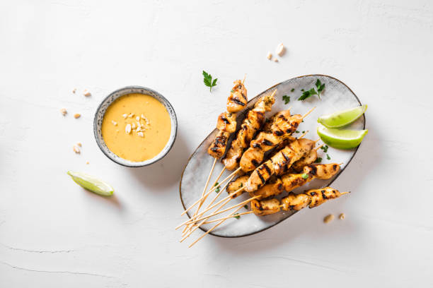 istock Chicken grilled satay skewers 1320934275