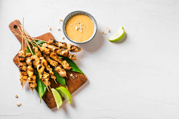 istock Chicken grilled satay skewers 1320934283