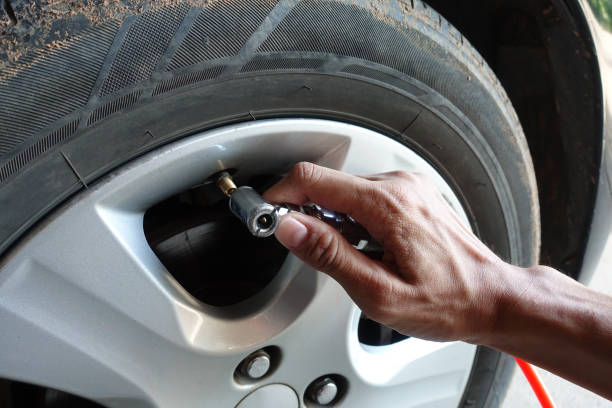 istock Fill air into a car tire 1320934326