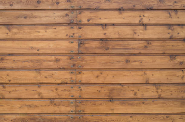 istock Old brown wooden wall closeup 1320936585