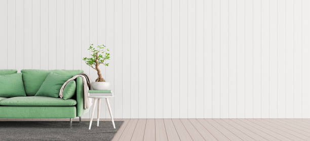istock Living room interior design. Mock up with green sofa, empty white wall with free space on right 3D render 1320937828